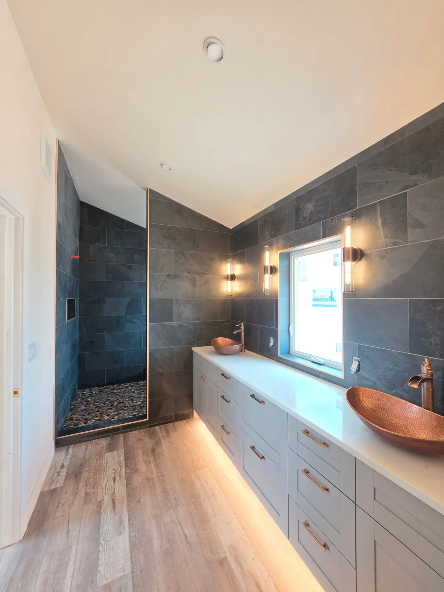 Slate tile walk-in shower built over a waterproof membrane in Golden, CO