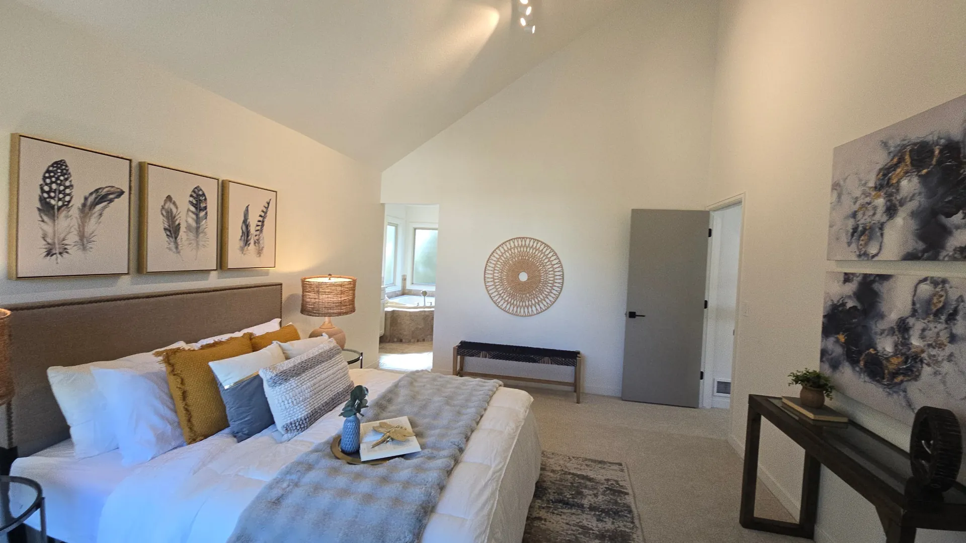 Remodeled bedroom with vaulted ceiling and carpet in Golden, CO