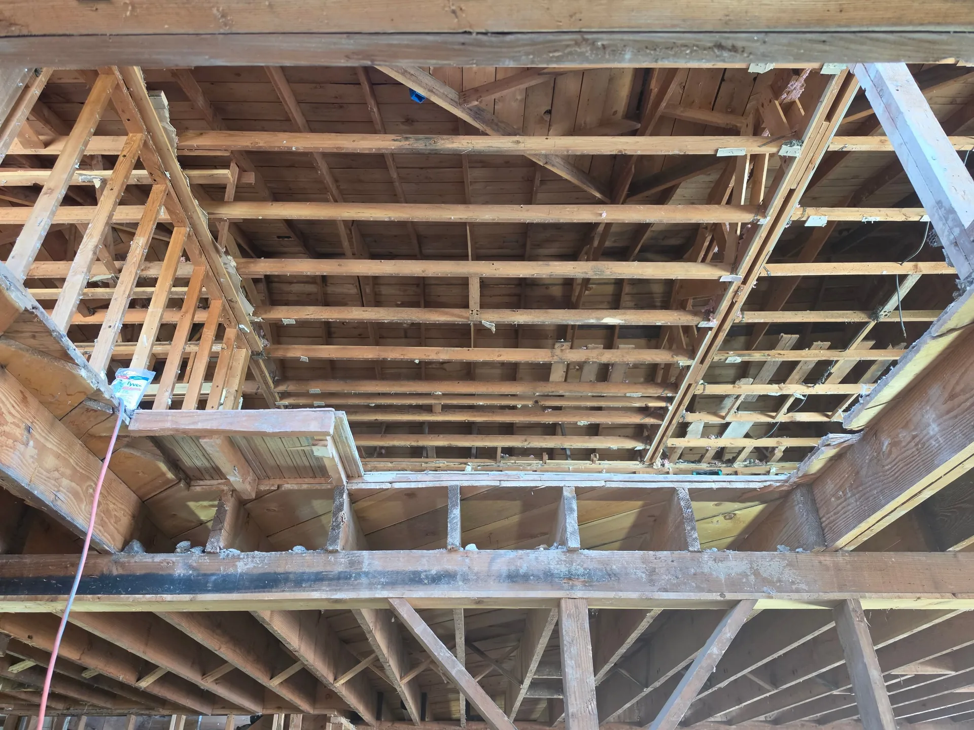 Exposed framing and joists during a remodel in Golden, CO